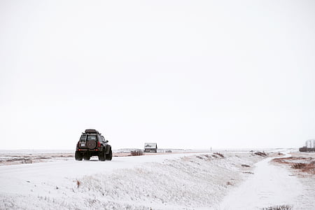 brown SUV on road during daytime thumbnail