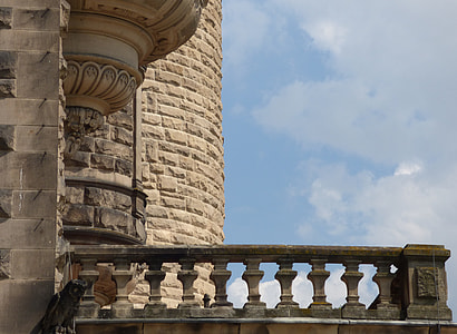 photo of grey and brown concrete baluster under white sky thumbnail