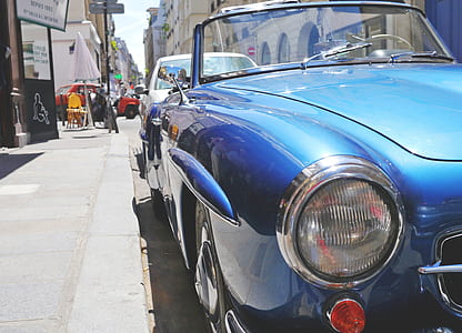closeup photo of blue car thumbnail