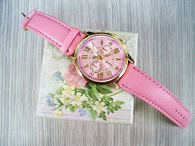 photo of round gold-colored bezel pink face chronograph watch thumbnail