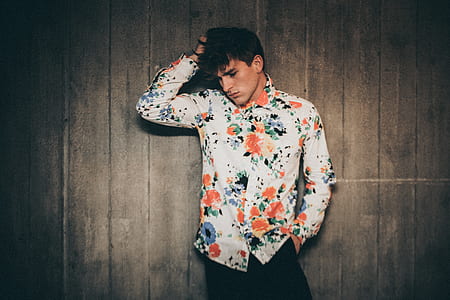 man in white and orange floral dress shirt thumbnail