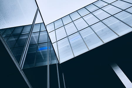 low-angle photo of gray concrete building thumbnail