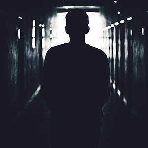 silhouette of man at alley thumbnail