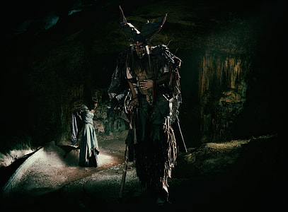 horned male character walking near woman in gray dress wallpaper thumbnail