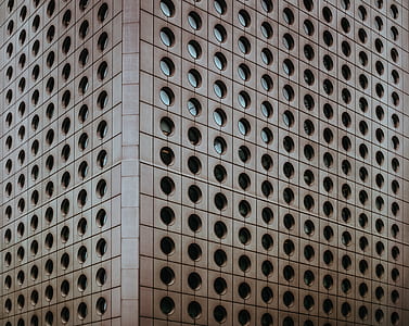 architecture photography of brown building thumbnail