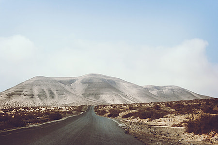 white mountain near brown land thumbnail