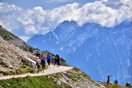 people walks on pathway during daytime thumbnail