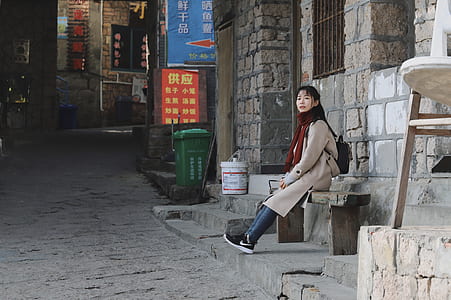 woman sitting on bench thumbnail