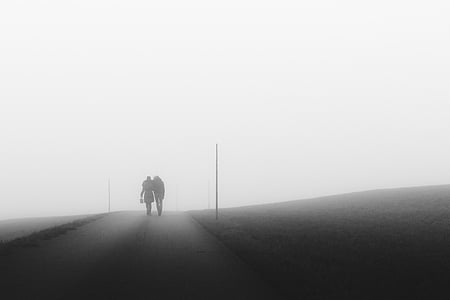 two person walking on road thumbnail