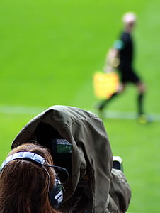 Woman Taking Picture on Man thumbnail