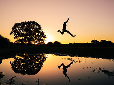 jump shot photo of man silhouette thumbnail