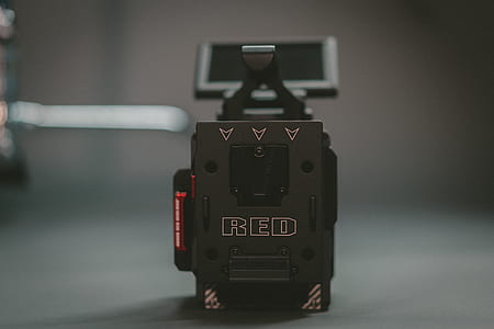 selective focus photography of black and gray Red electronic device thumbnail