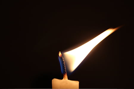 close up photography of lit candle thumbnail