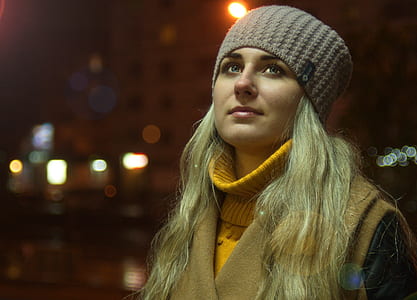 shallow focus photo of woman looking up thumbnail