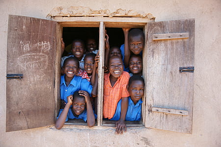 boys smiling in window thumbnail