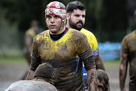 man wearing jersey shirt covered with dirt thumbnail