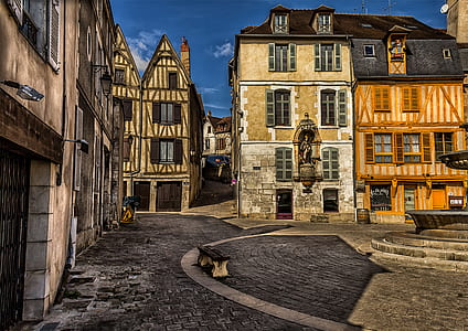 brown concrete buildings at daytime thumbnail