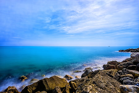 gray and brown stones on seashore thumbnail