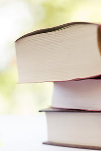 close-up photo of three books thumbnail