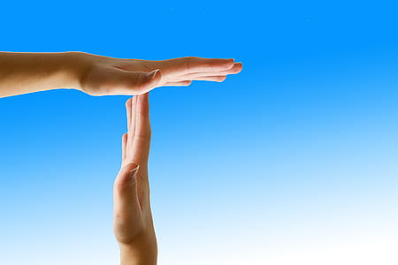 person's hands signaling time out thumbnail