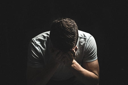 man covering his eyes thumbnail