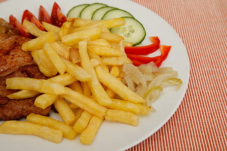 fries with grilled meat on plate thumbnail