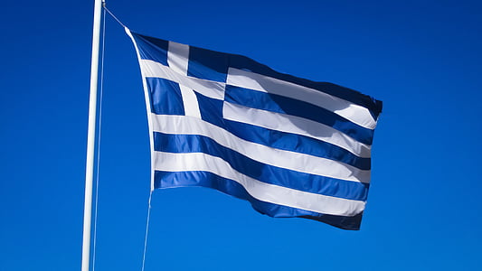 blue and white striped flag during daytime thumbnail