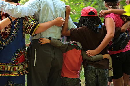 photo of group of people hugging thumbnail