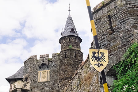 gray castle under white clouds at daytime thumbnail