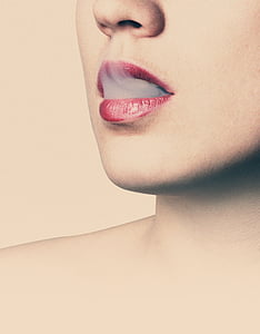 person's red lips photo thumbnail