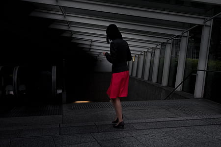 woman standing facing backward thumbnail