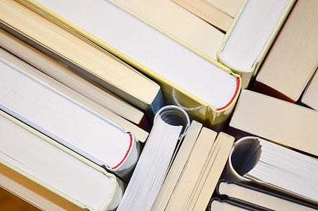 high-angle photography of clustered closed books thumbnail
