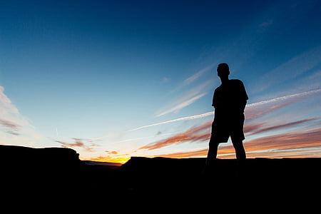 silhouette of man during golden hour thumbnail