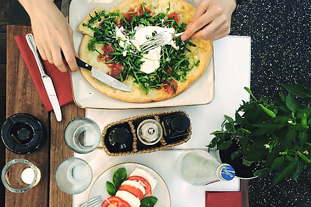 Eating pizza dinner at cafe restaurant thumbnail