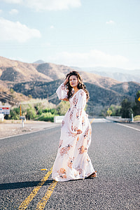 woman standing in the middle of the road thumbnail