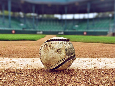selective focus photography of white baseball inside the stadium thumbnail