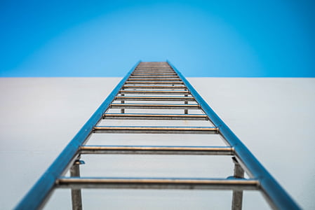 low angle photography of silver ladder thumbnail