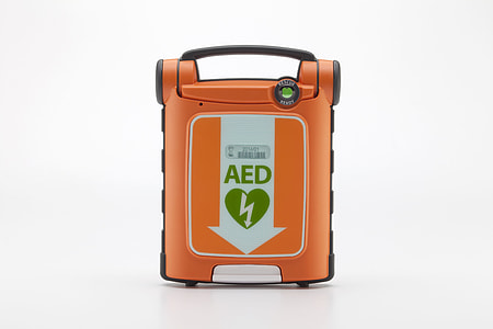 rectangular orange and white AED wireless portable device thumbnail