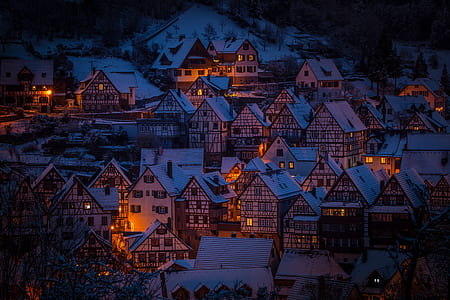 assorted houses with orange lights during daytime thumbnail