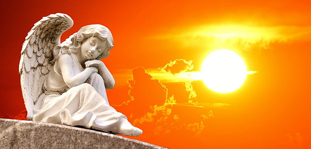 white ceramic lady angel figurine with sunset background thumbnail