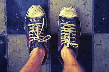 person wearing black-and-white low-top shoes thumbnail