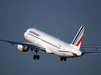 white Airfrance airplane flying during daytime thumbnail