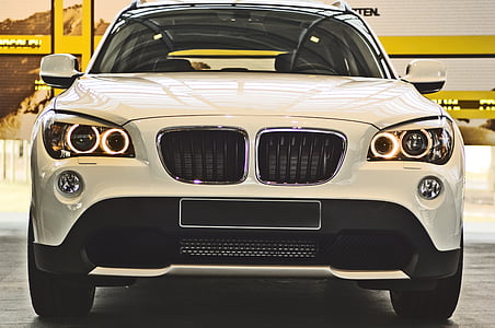closeup photography of white BMW X1 SUV thumbnail