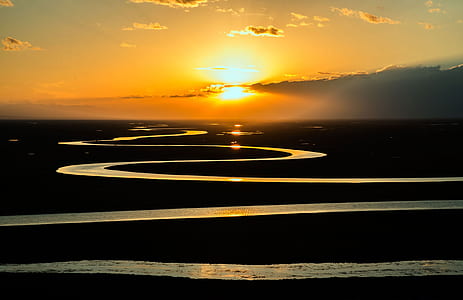 Large Body of Water Stream during Dawn thumbnail