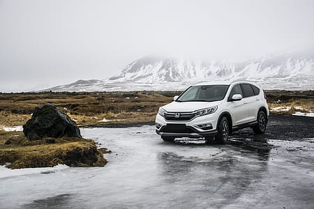 white Honda SUV on ground thumbnail