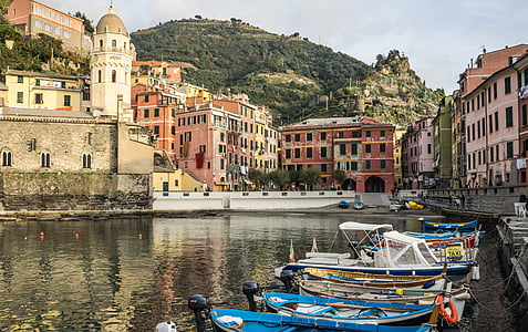 blue boat on body of water thumbnail