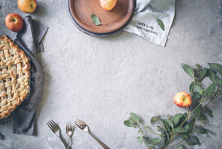 three stainless steel forks on gray concrete floor thumbnail