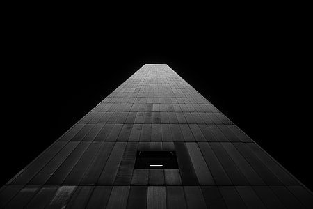 low angle grayscale photography of high-rise building thumbnail