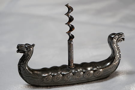 black cork screw on white surface thumbnail