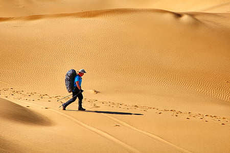 man walking on desert thumbnail